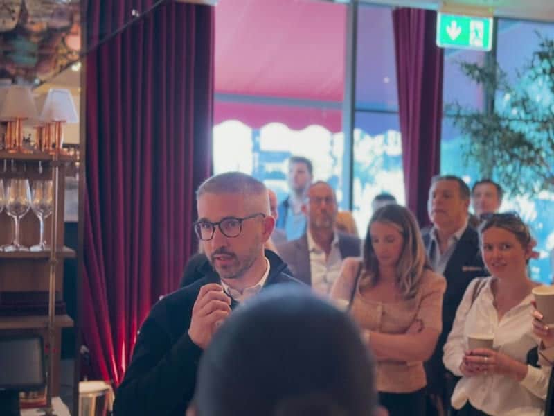 A guest speaking to the room at the LonRes Mix and Mingle at Babbo