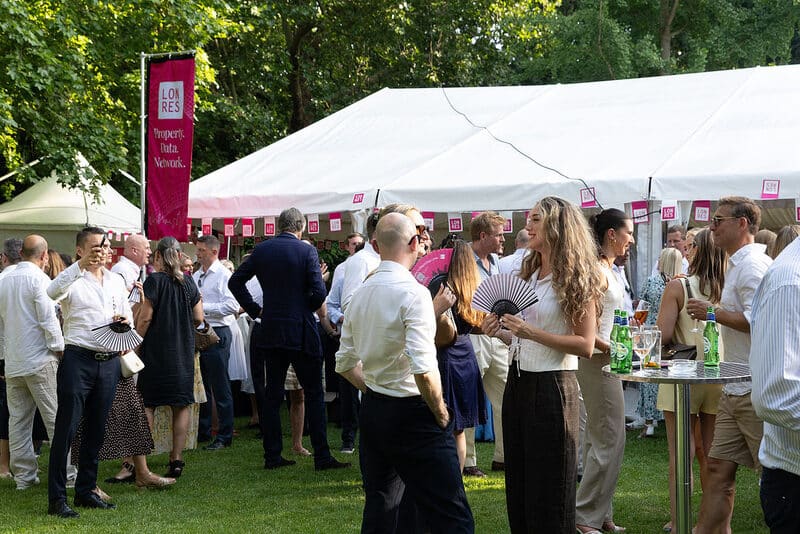 Guests in the garden at the LonRes Summer Party in Belgrave Square