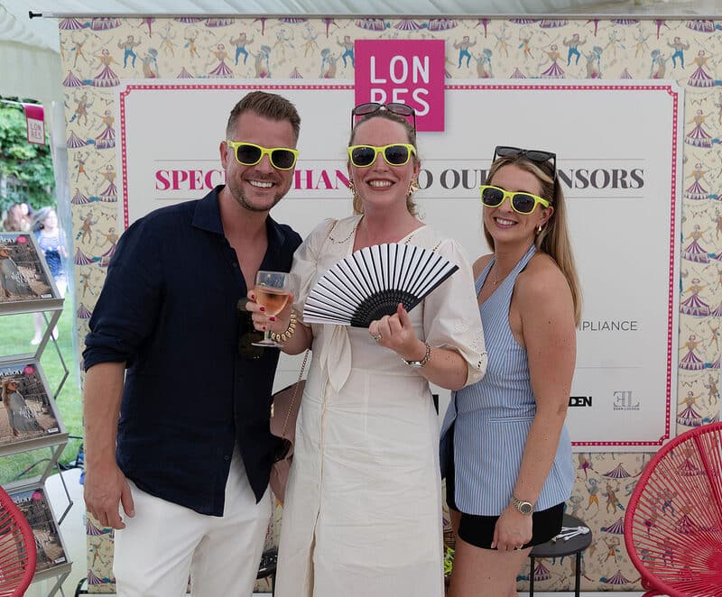 Guests at the sponsor wall at the LonRes Summer Party